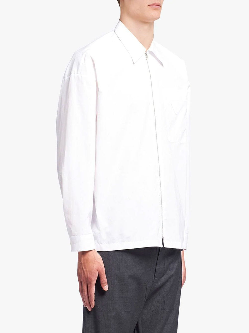 Camisa de algodón blanco con cremallera