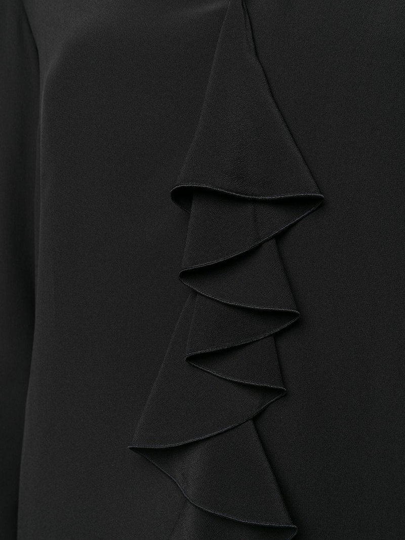 Blusa negra de seda con escote pico