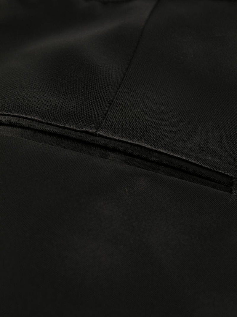 Pantalón negro de pinzas en satén