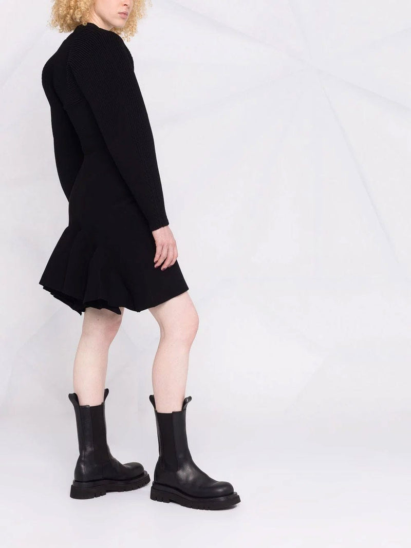 Falda recta con godet en lana negra