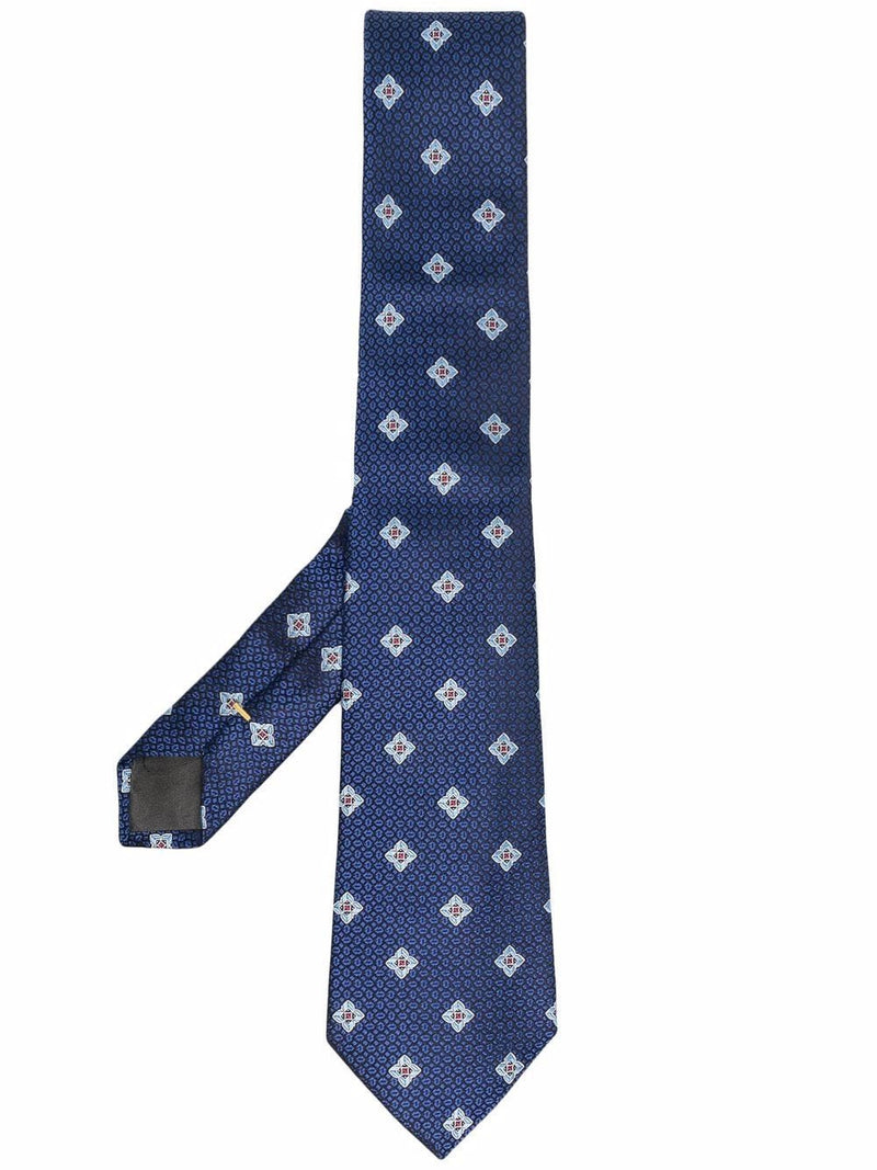 Corbata azul marino con flores geométricas